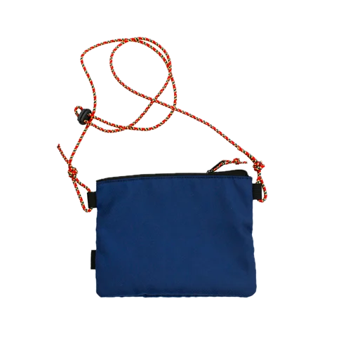 Blue pouch with a red and black cord 