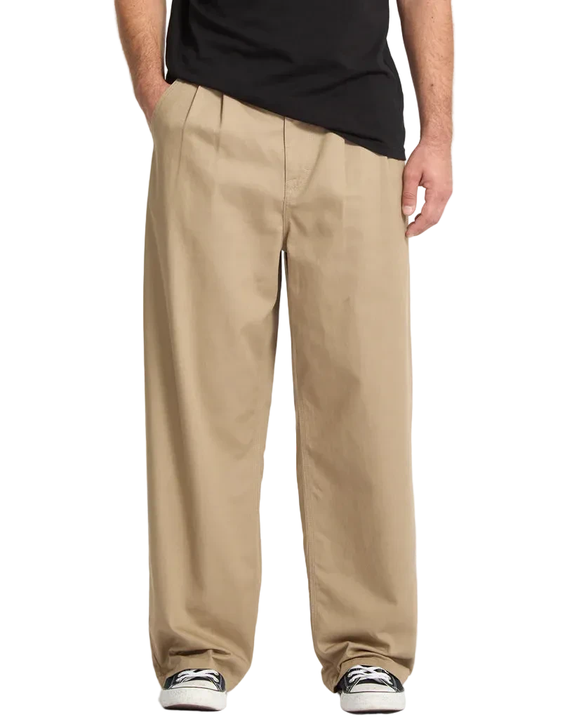 Person wearing beige pants  fit