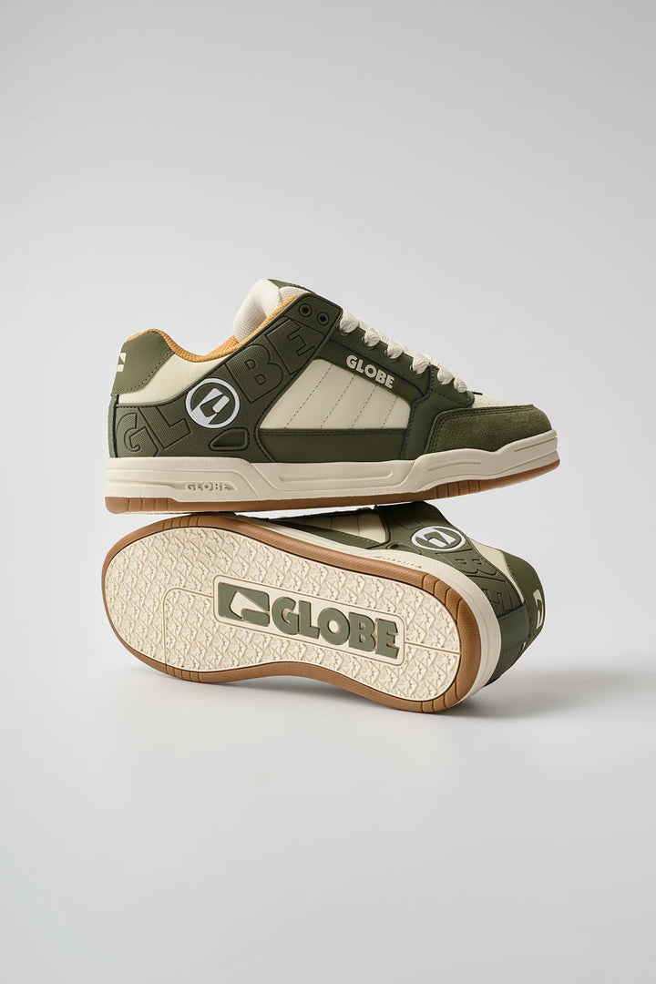 Globe tilt green skate shoes in a pair