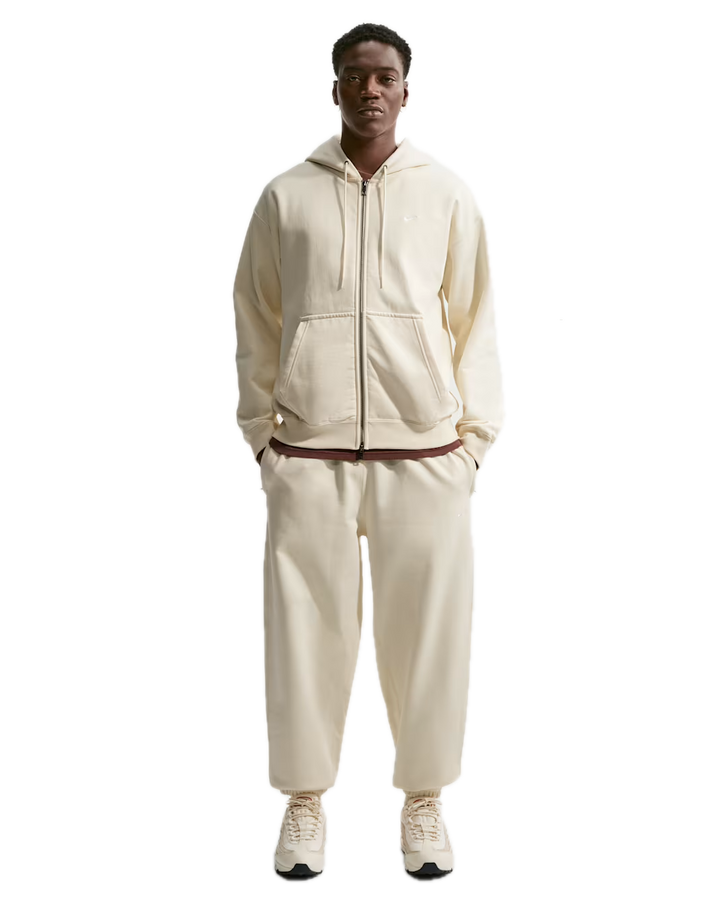 SOLO SWOOSH CUFFED FLEECE PANT COCONUT MILK