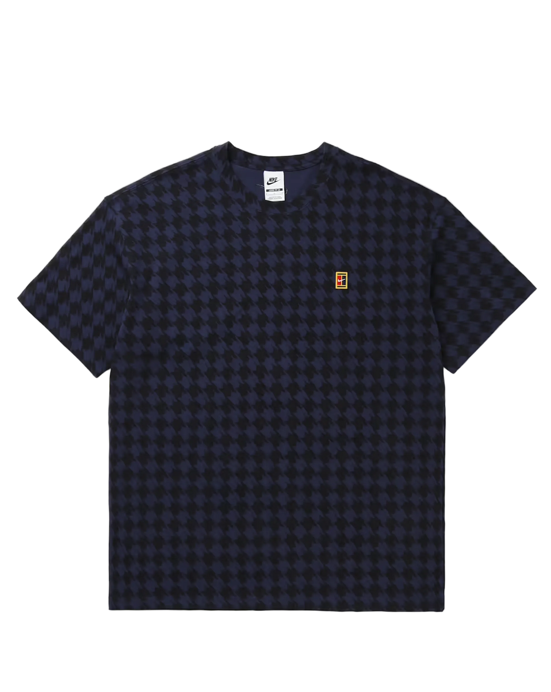 A dark navy blue short-sleeve t-shirt with a subtle tonal checkerboard pattern, featuring a small orange and white logo on the left chest, displayed flat against a light gray background.