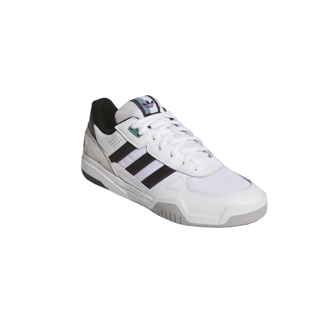 White Adidas sneaker with black stripes on a light gray background