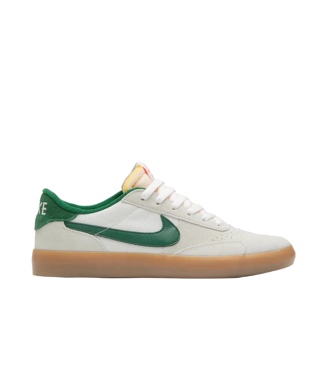 White sneaker with green accents 