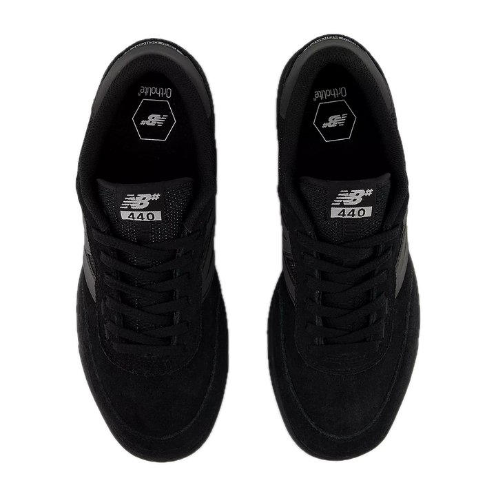 Black sneakers with New Balance logo 