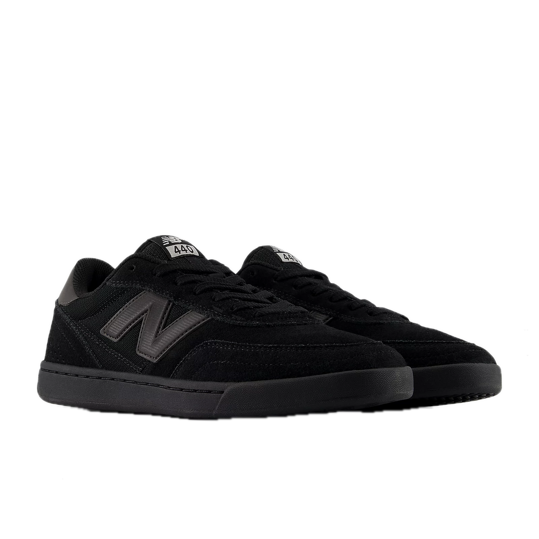 Black sneakers with New Balance logo 