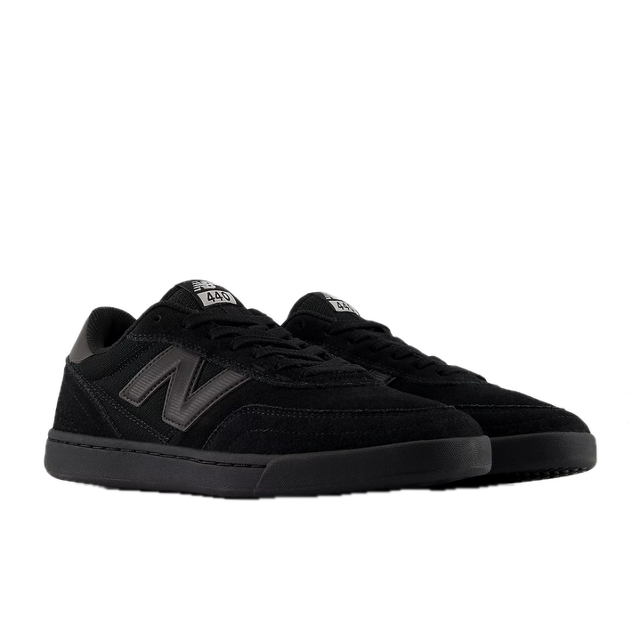 Black sneakers with New Balance logo 