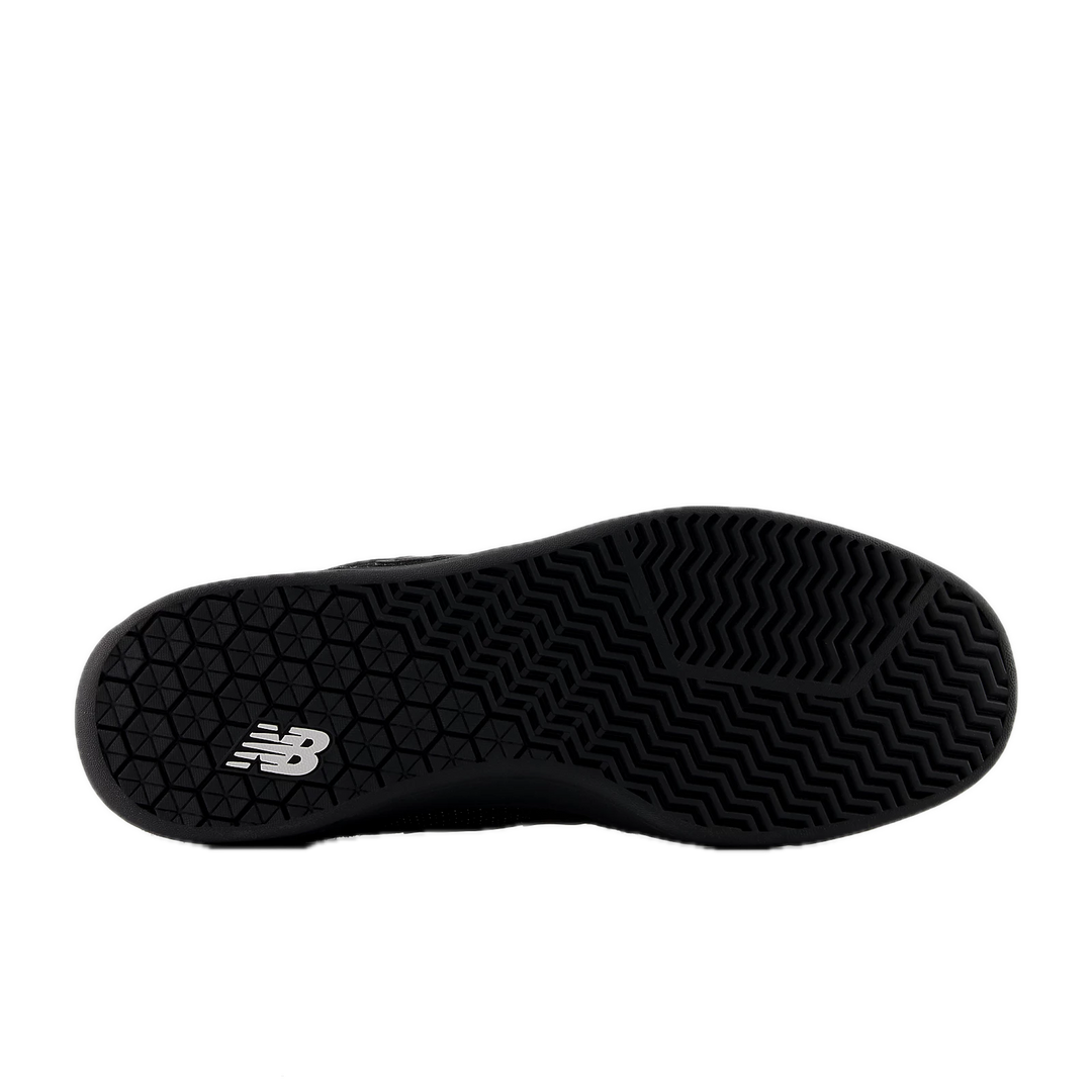 Black sneaker sole with New Balance logo 