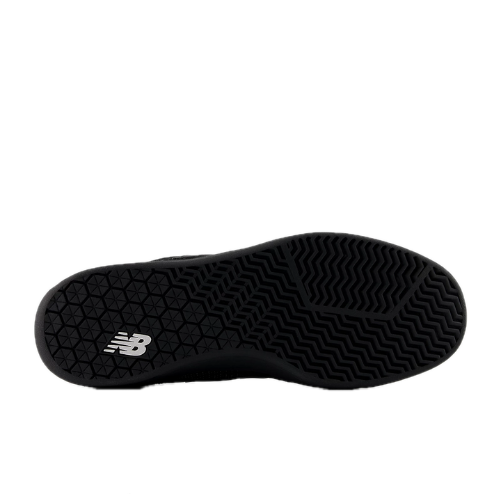 Black sneaker sole with New Balance logo 