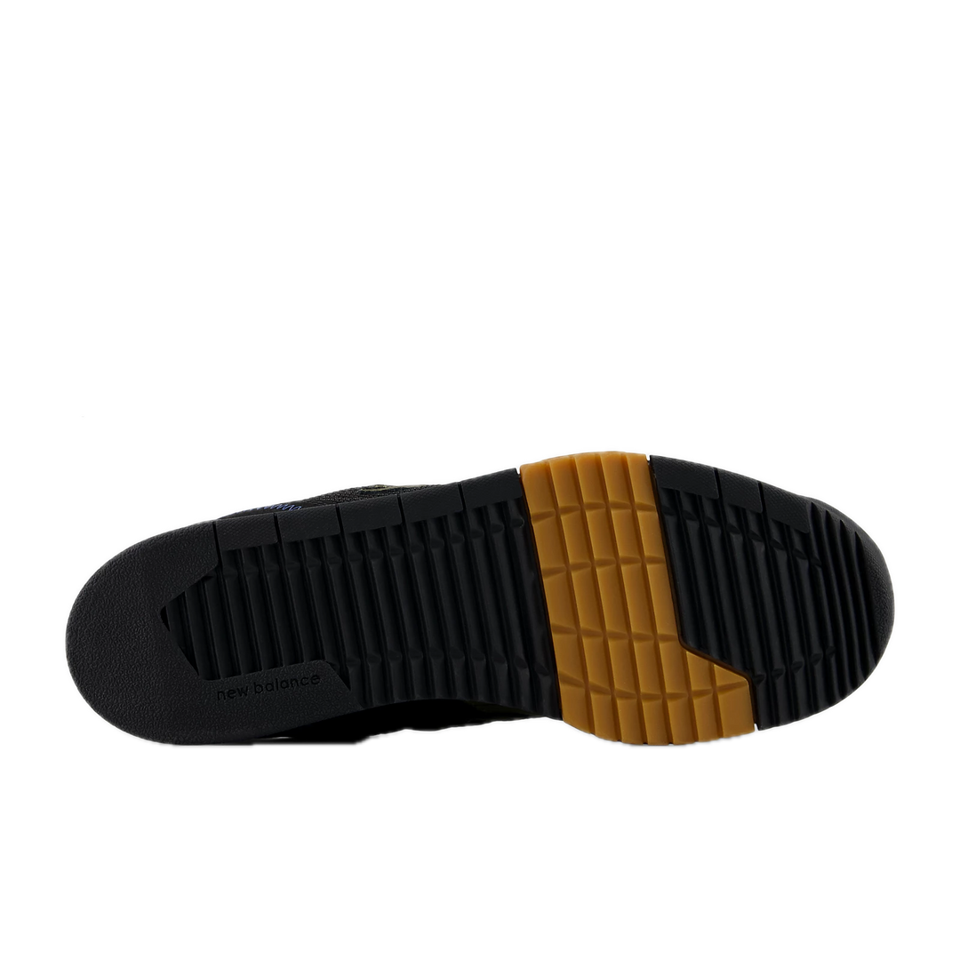Close-up of a shoe sole with black and brown color